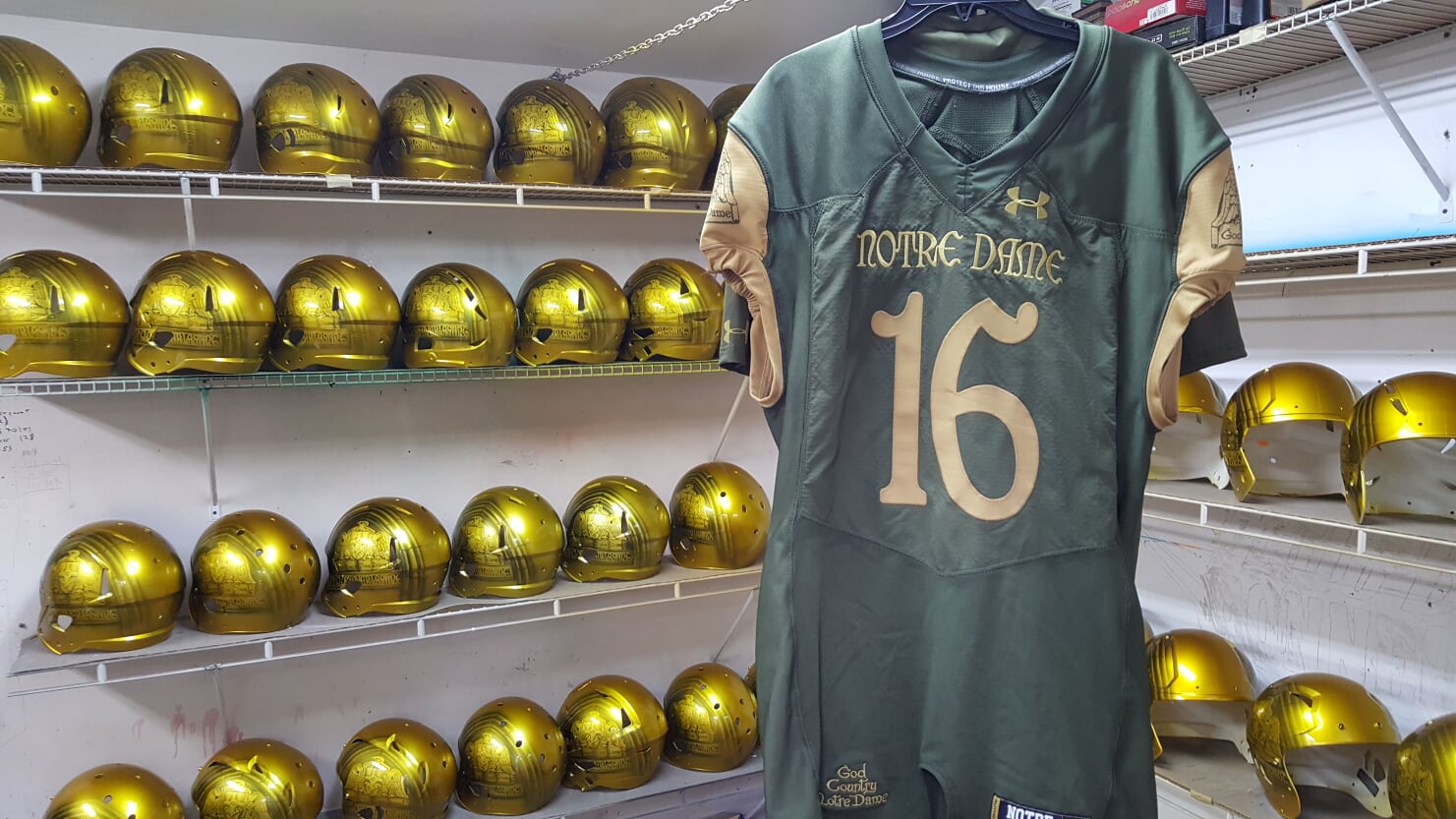 Collection of Notre Dame College Gold Painted Football Helmets