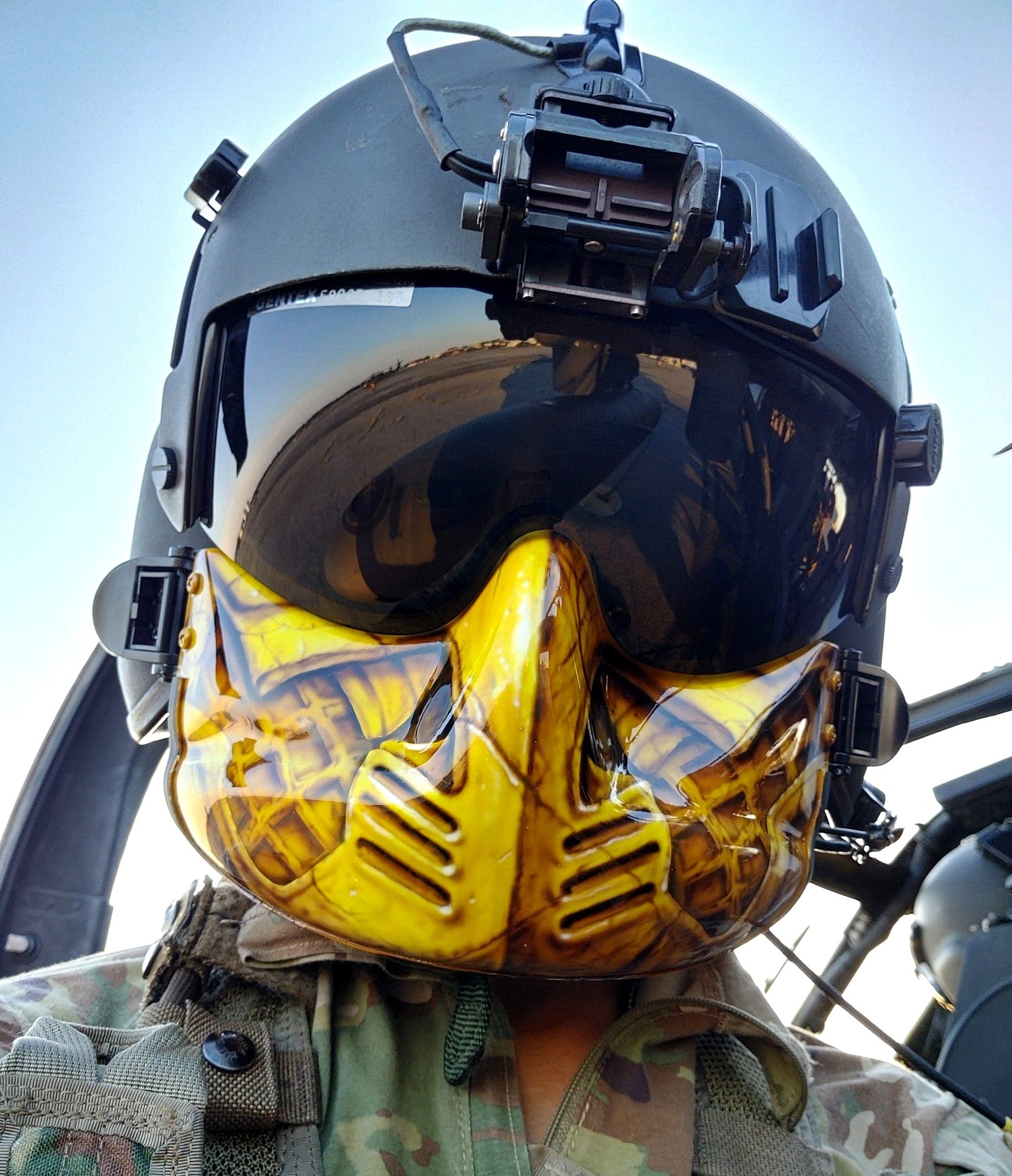 Soldier Wearing Airbrushed Predator Mask.